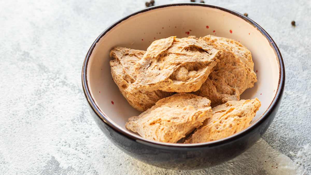 Seitan, a meat alternative made from vital wheat gluten, placed in a bowl