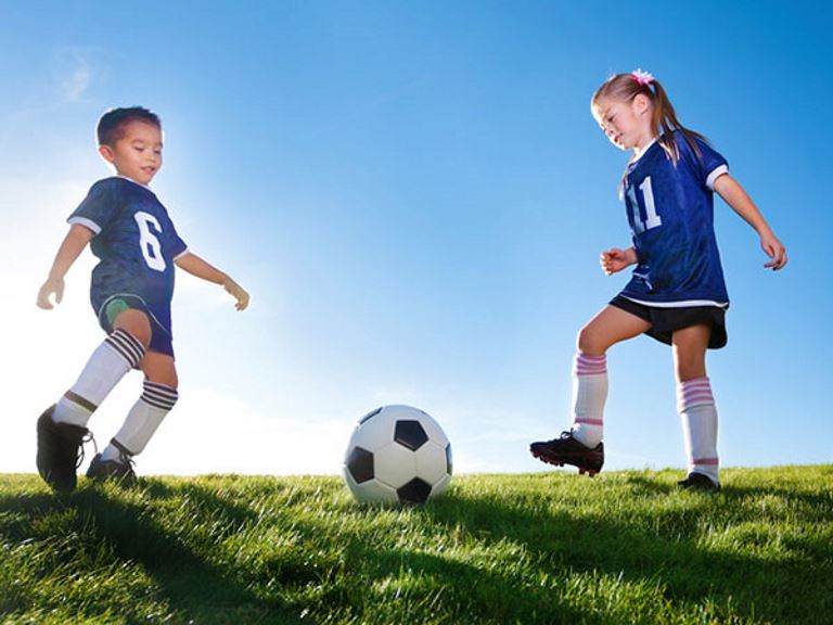 kids playing soccer - 15 Fueling Snacks to Take to Your Child's Game