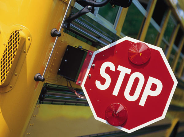 Stop sign on a school bus - How to Keep Your Food-Allergic Child Safe at School