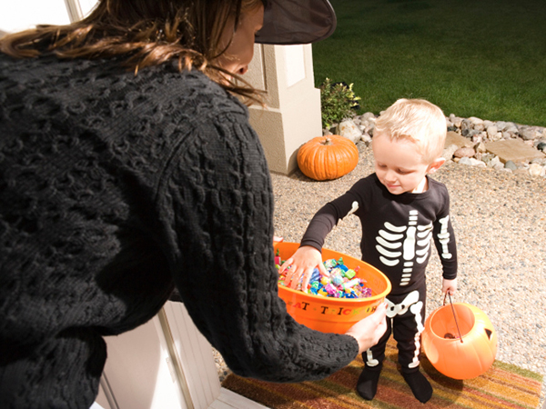 Young child trick-or-treating - 7 Ways to Make Halloween Safer for Kids with Food Allergies