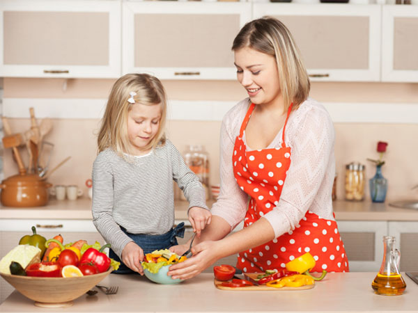 mom cooking with kid