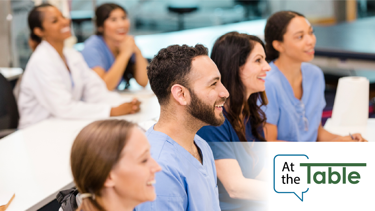 Med students and doctors at the table