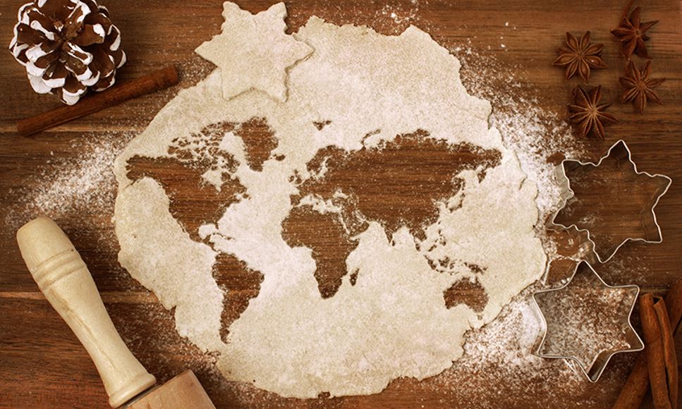 cookie dough with map of the world cutouts